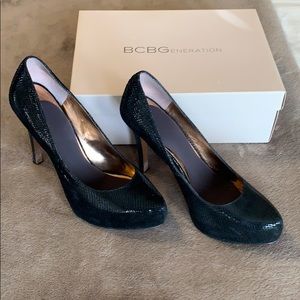BCBGeneration black heels, size 9.5 snake print
